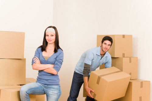 Loading furniture into a removal truck in Croydon