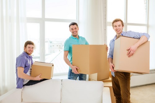 Local removals crew loading furniture for a short-notice move in Croydon
